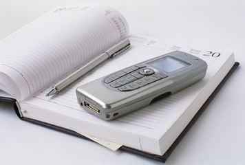 cell phone on a notebook
