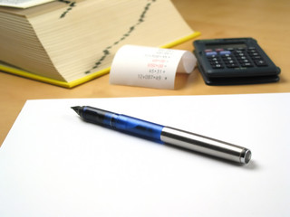 pen lying on blank paper