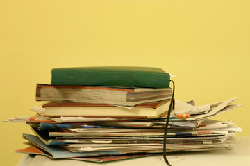 a stack of old magazines