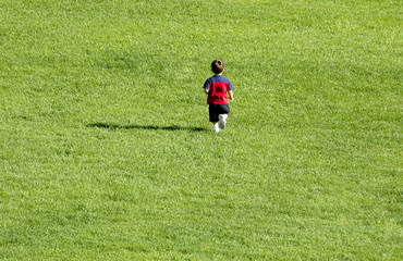 boy-running-grass