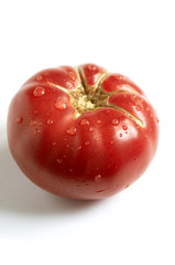  juicy tomato with droplets