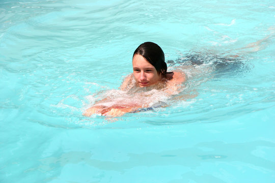 teen male swimming