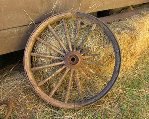 broken stagecoach wheel, landscape view (centered)