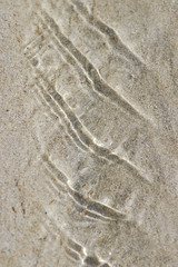 ruissellement d'eau sur le sable