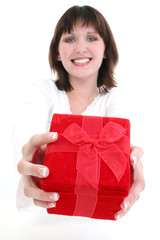 woman in white with red gift box