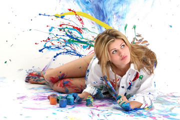 beautiful young woman painting