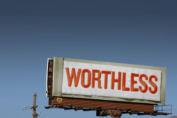 worthless - billboard sign