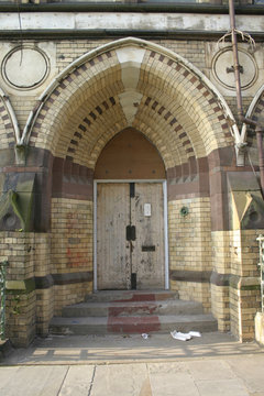 door of derelict schoolhouse