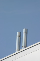 two stainless steel ventilation chimneys