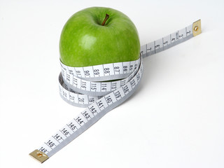 Apple with measuring tape. - 137413