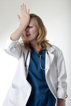 stock photo of upset lady doctor