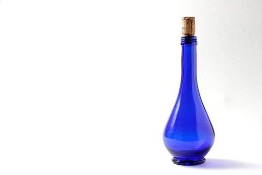 Blue Oil Bottle Isolated On White Background