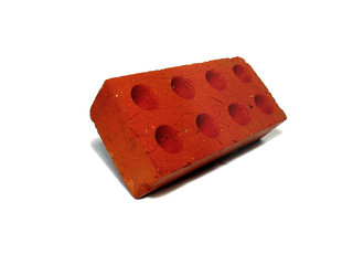 one red brick on a white background