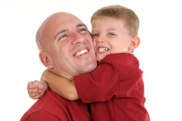 stock photography: son hugging dad around the neck