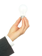businessman's hand holding a light bulb