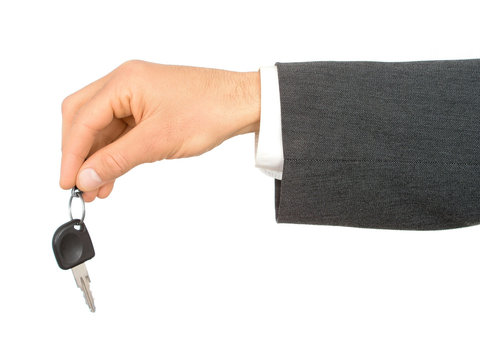 Businessman's Hand Holding Car Key