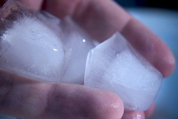 holding ice cubes