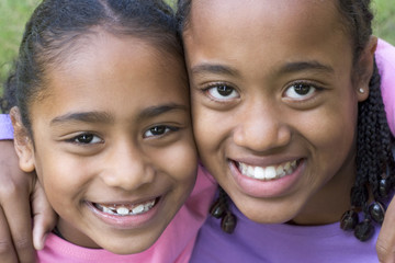 smiling sisters