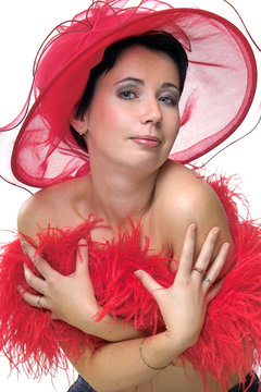 lady in red hat embrassing herself
