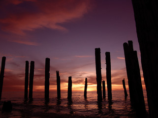 broken pier sunset
