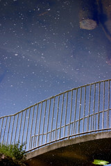 bridge stars water reflection