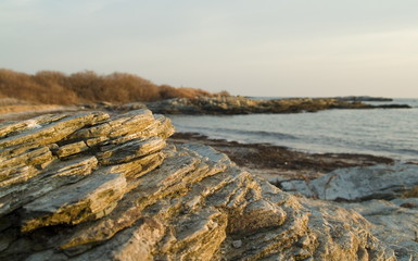 rocky shoreline at sunset
