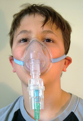 boy with oxygen mask