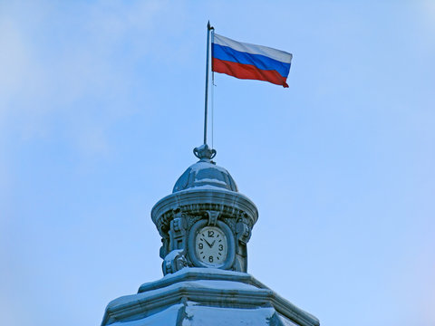 russian flag and clock