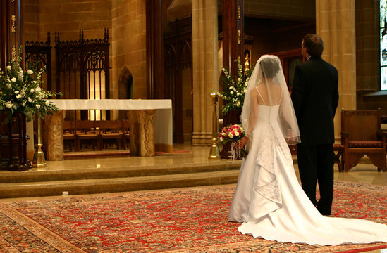 bride and groom at altar (closeup)