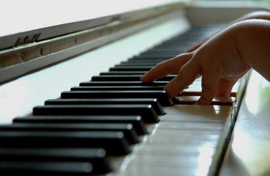 child playing the piano