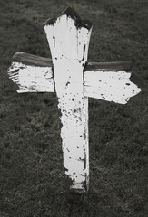 dilapidated wooden cross