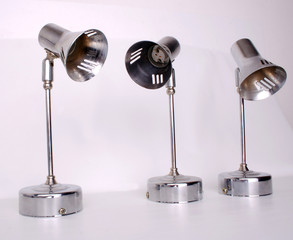 3 silver stage lights