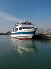 cruise ship docked on cuyahoga river