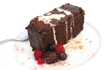 isolated chocolate cake and berries
