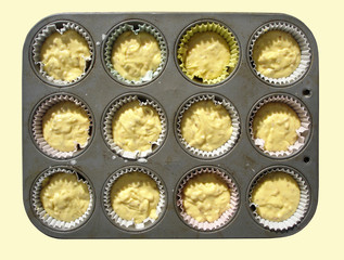 tray with milk muffin mass