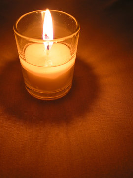 candle in a glass