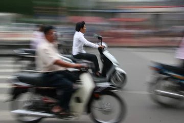 Fotobehang scooters, ho chi minh city © Ralph Paprzycki