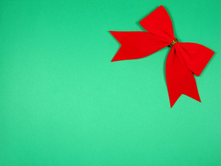 red bow at the top right with green background