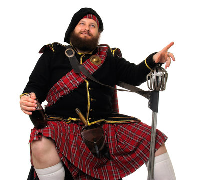scottish warrior with bottle of red wine