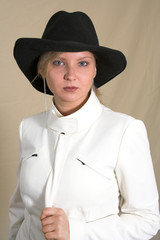 attractive blond young woman in a hat