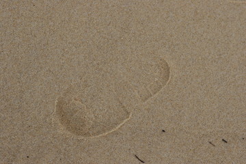 Fototapeta na wymiar empreinte dans le sable
