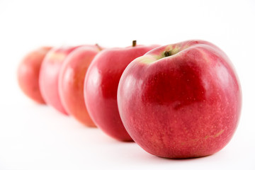 apples against white background
