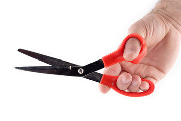 hand holding scissors