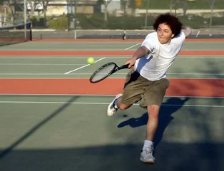  teenage boy playing tennis © Galina Barskaya