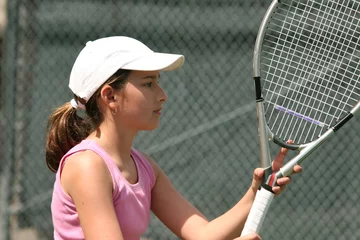 Poster young girl playing tennis © Galina Barskaya