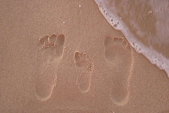 footprints on the beach