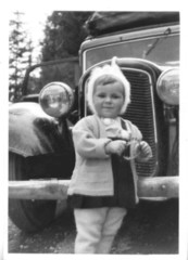 little girl and old car