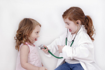 sisters playing doctor