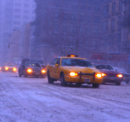 taxi in winter storm in nyc