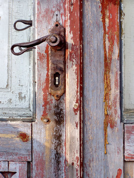 old door with a rusty handle